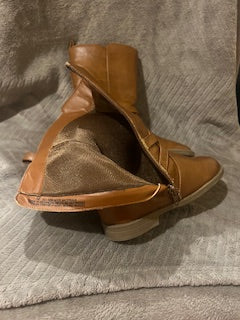 Showing the inside condition of boots and size.