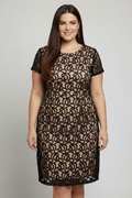 Black lace dress with beige underlay on European model